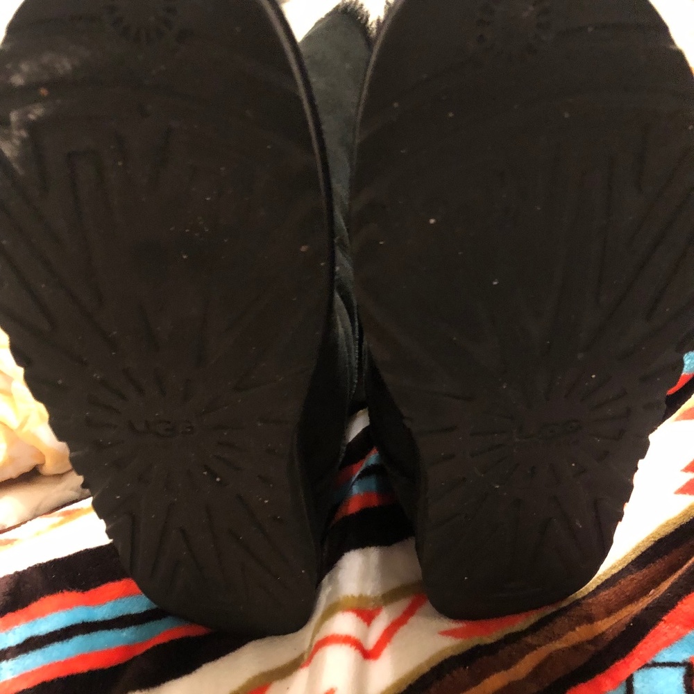 Three pair of UGG boots.  Size 8